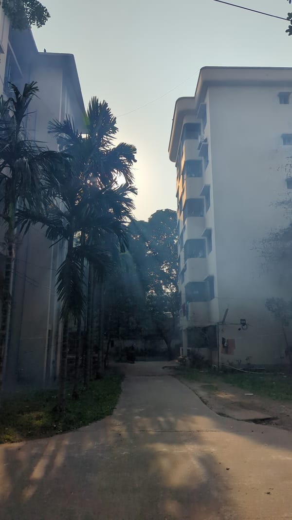 Man operates fogging equipment on Dhaka street