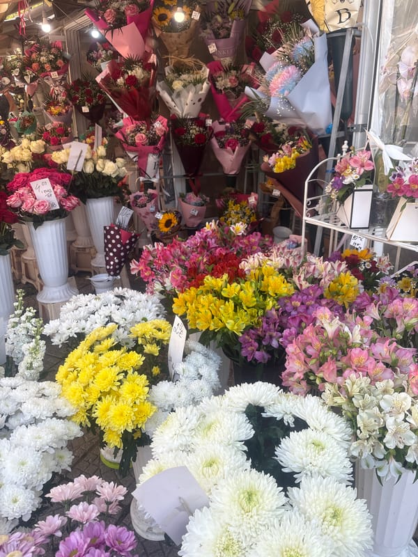 Person with 'Need Money for BMW' phone spotted at flower market