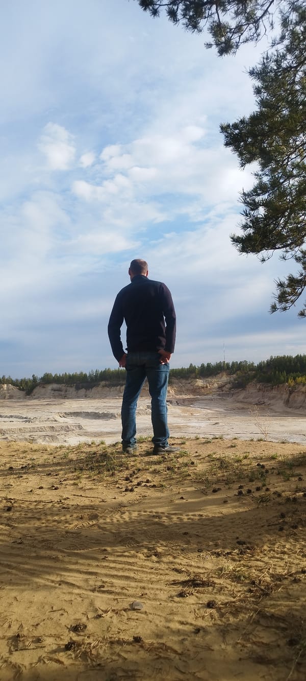 Person explores sandy terrain and wildlife tracks near Yakutsk