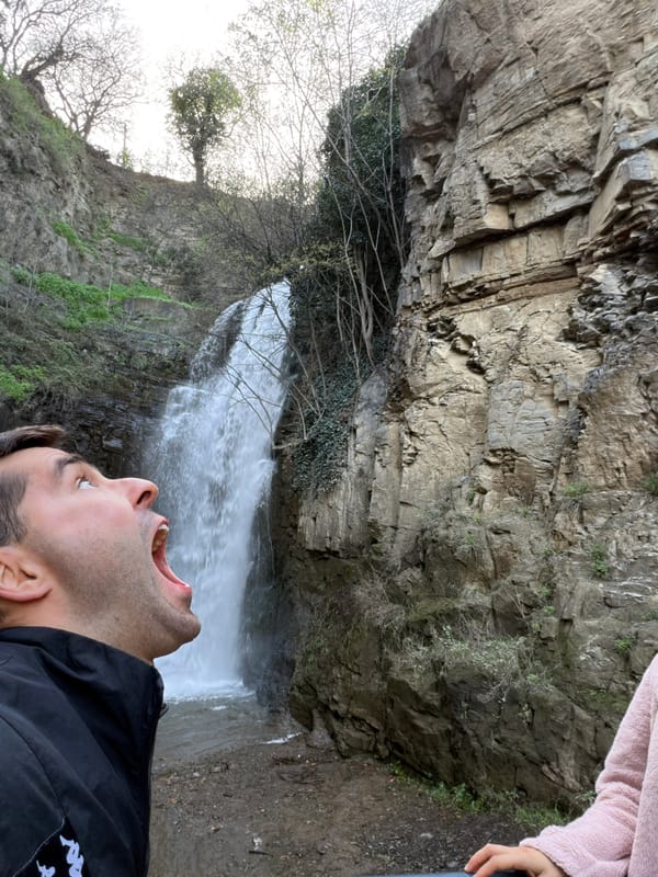 Street musicians perform near Gabriadze Theater in Tbilisi