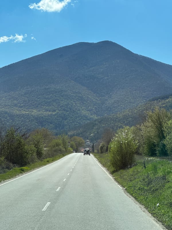 Mountain road with vehicle traffic documented near Varvara, Bulgaria