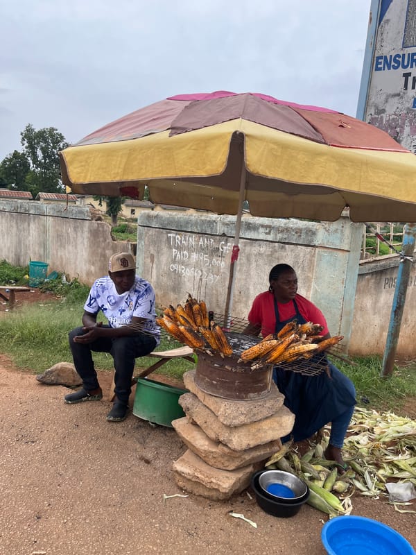 Everyday street life across Jos on a grey afternoon