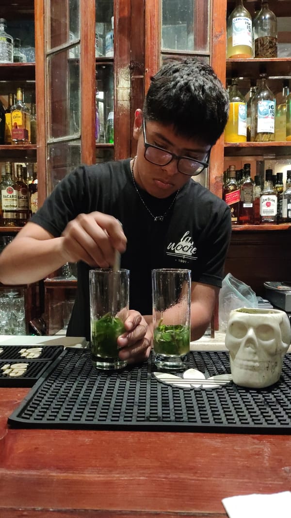 Early morning social gathering documented at Barranco bar