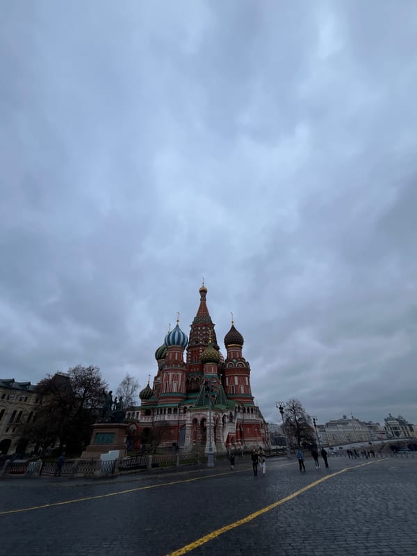 Tourist captures Red Square landmarks during Moscow afternoon visit
