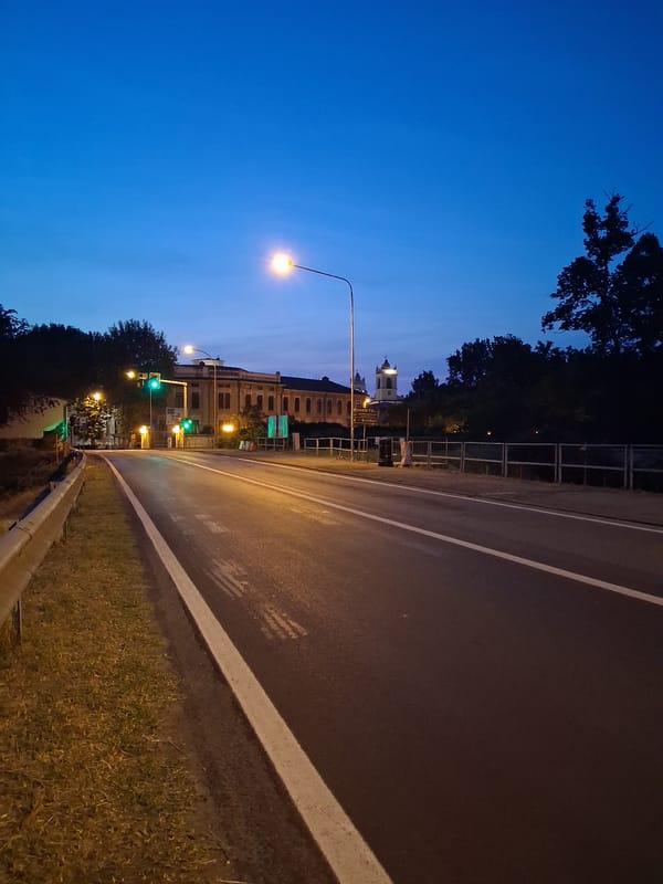 Evening documentation of Colorno streets and resident during twilight