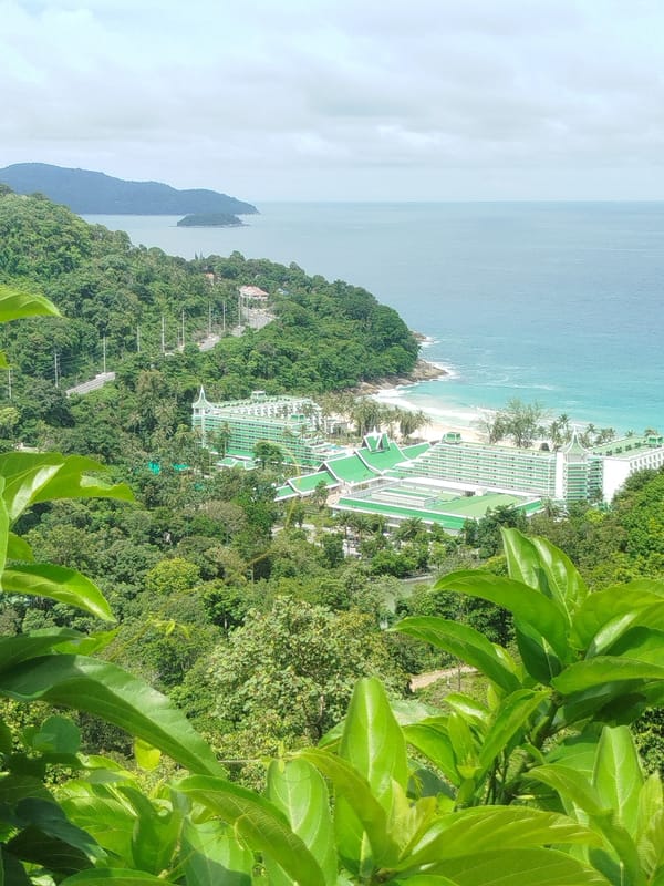 Hillside views over Karon's tropical coastline, Phuket