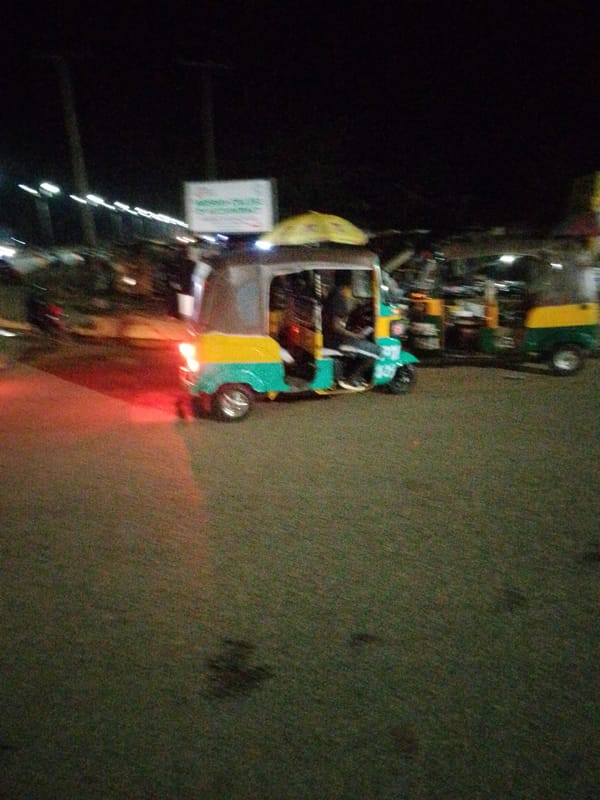 Bukuru streets alive with vendors, traffic, and nightlife