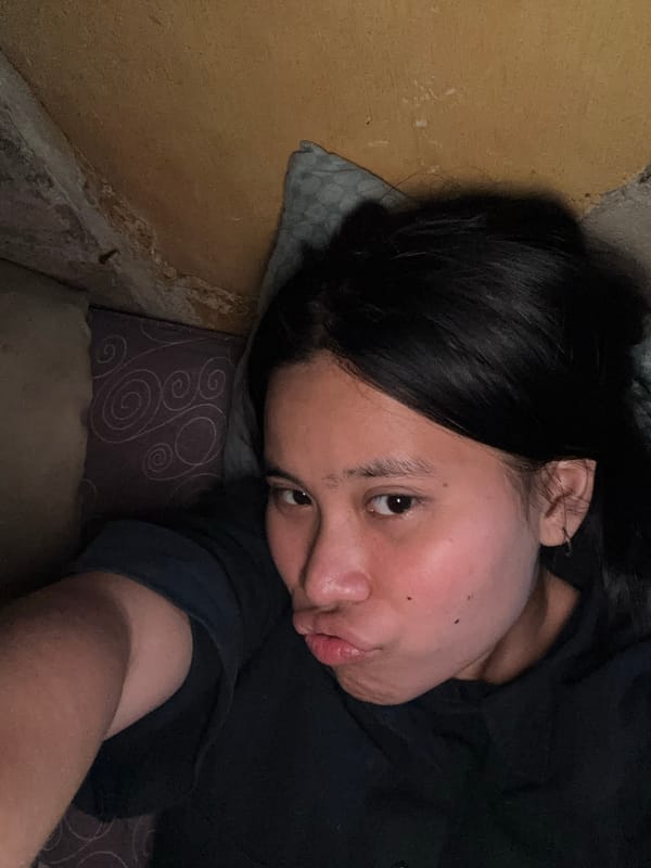 Lazy afternoon selfie session on a bed in East Jakarta