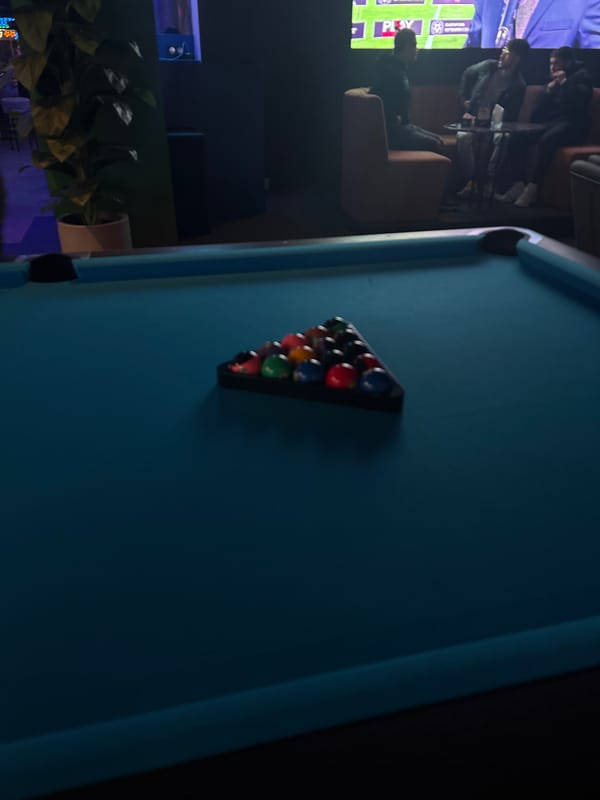 Evening social gathering at Varna bar features billiards, drinks