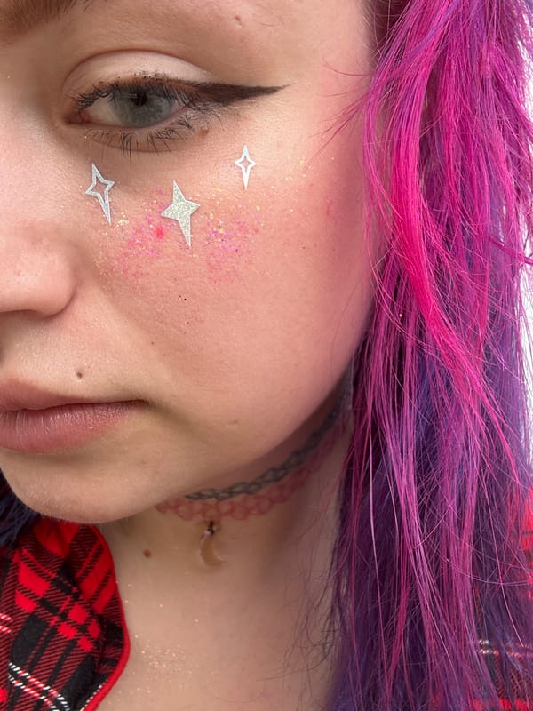 Bold pink and purple hair in a close-up Nha Trang portrait