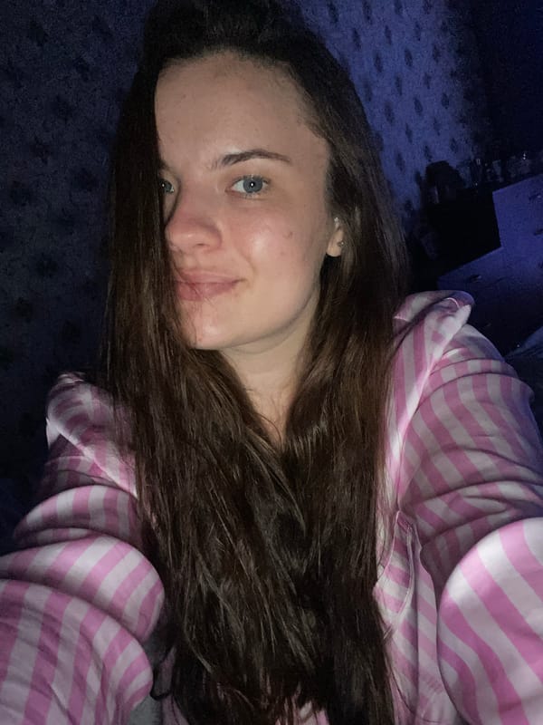 Cozy Poltava night: pajamas, fairy lights, and a playful Scottish Fold