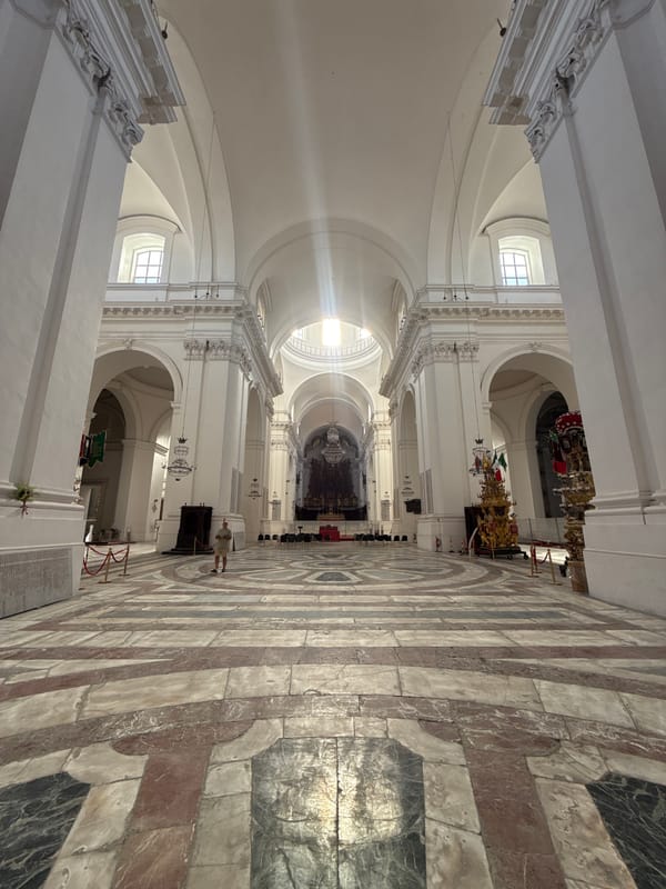 Tourist documents sunny afternoon scenes around Catania's historic cathedral district