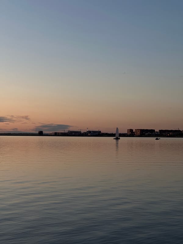Waterfront evening gathering at sunset in Kokshetau, Kazakhstan