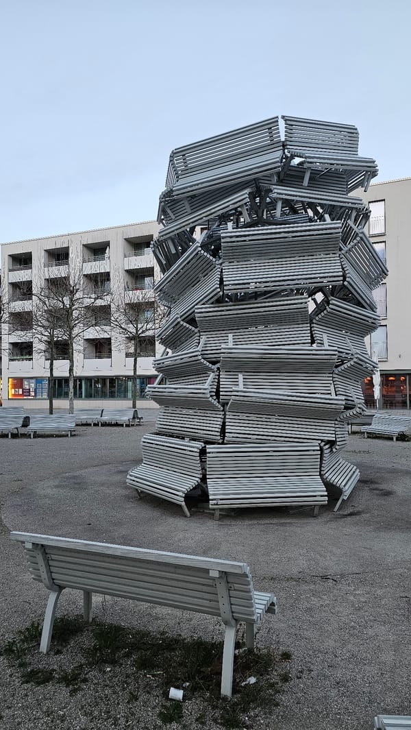 Stacked bench sculpture observed in Munich public square