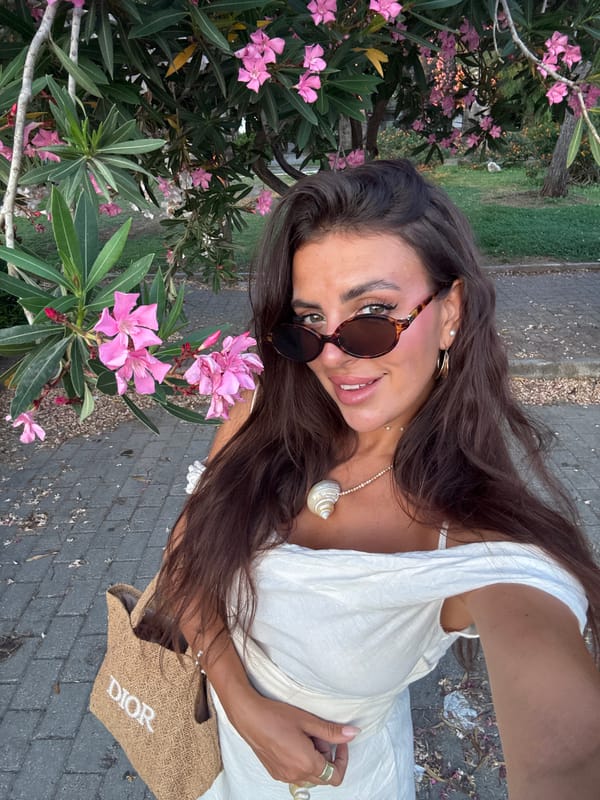 Fethiye harbor walk: oleanders, selfies, gulets, and a cat