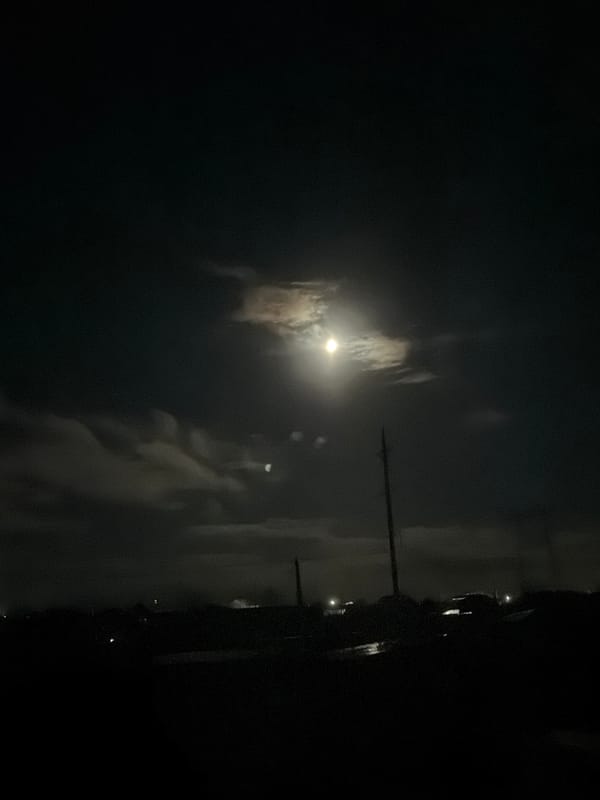 Night scene captured on illuminated street in Chaikovsky, Russia