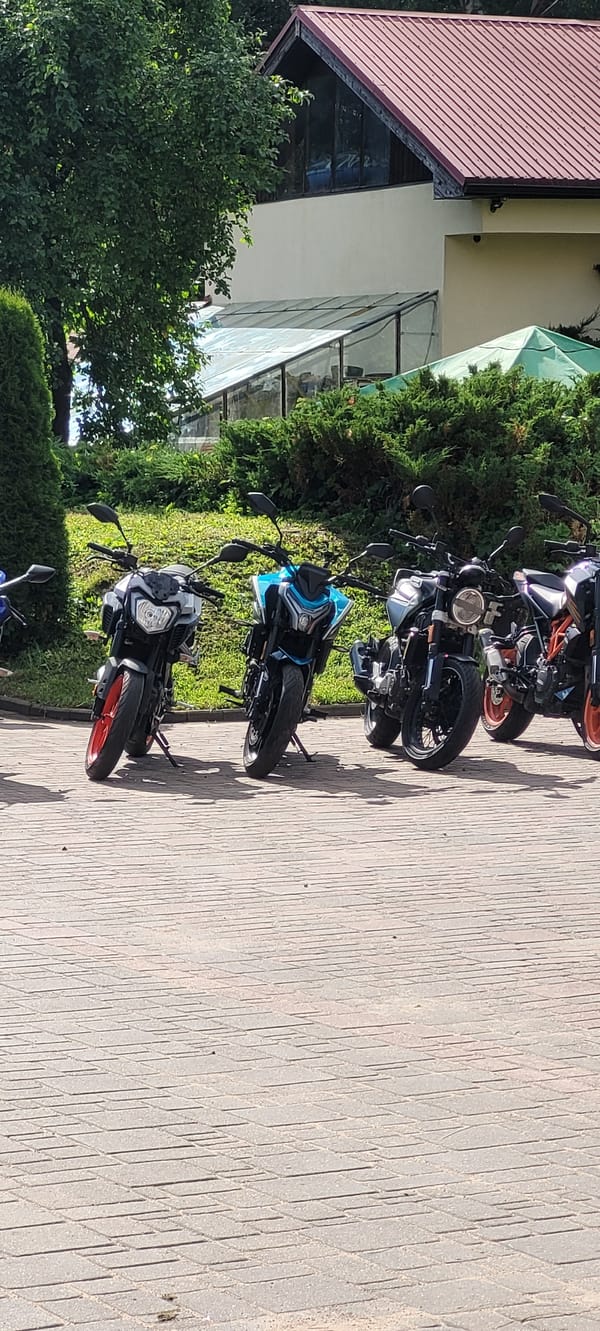 Motorcycle and ATV fleet parked at Riga rental lot