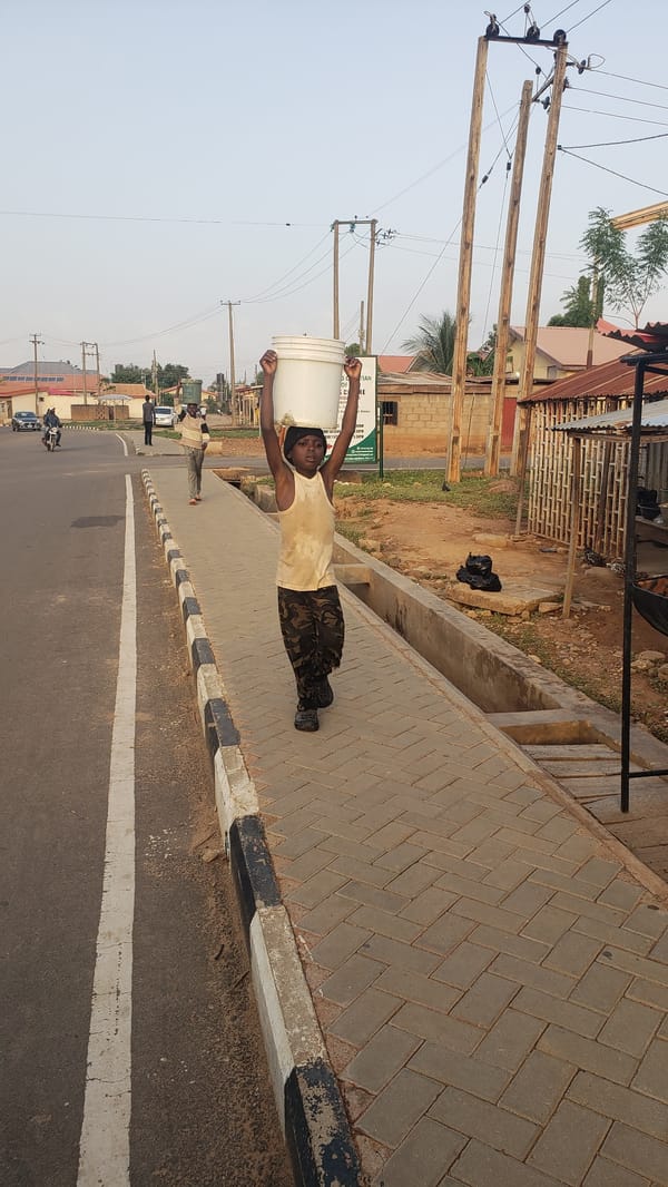 Daily life unfolds on Narayi streets near church headquarters