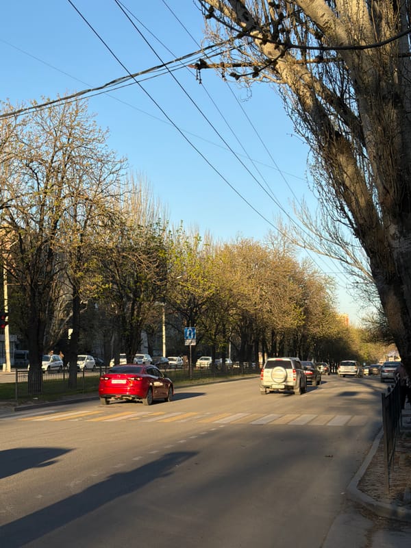 Street scene captured in Aksay, Russia with bare trees