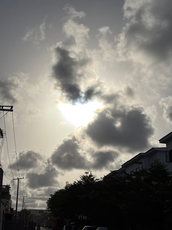 Man with phone observed on brick road in Igboefon