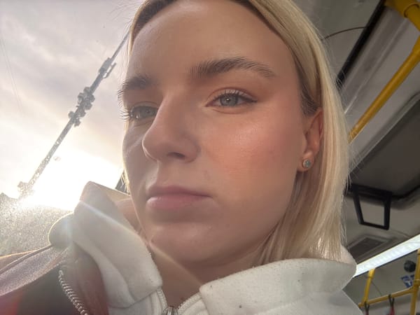 Woman takes selfies during early morning bus ride in Russia