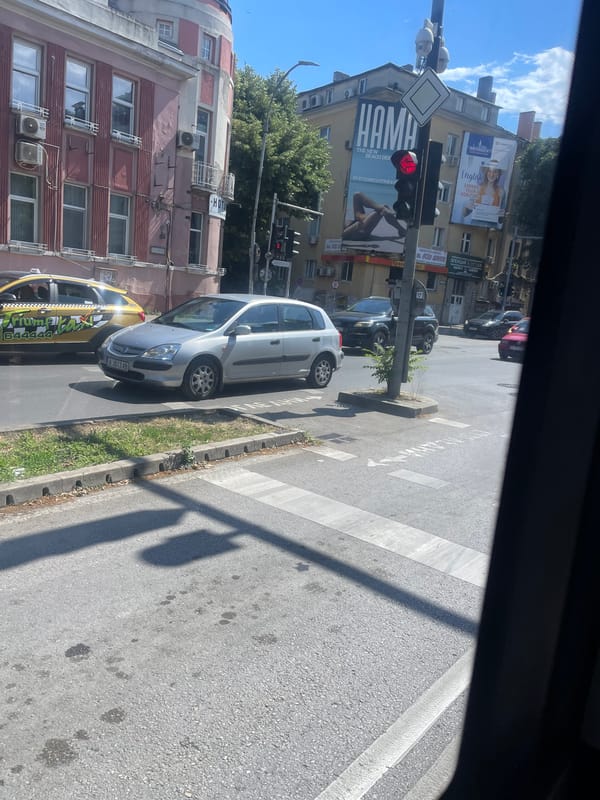Grey Honda Civic at a sunny Varna pedestrian crossing