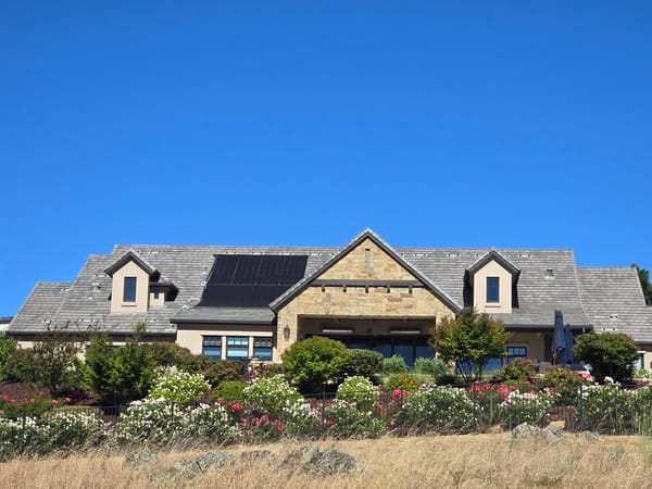 Upscale residential exteriors surveyed on a sunny afternoon