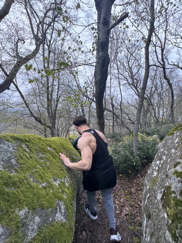 Hikers exercise on rocky hillside near Primorsko, Bulgaria