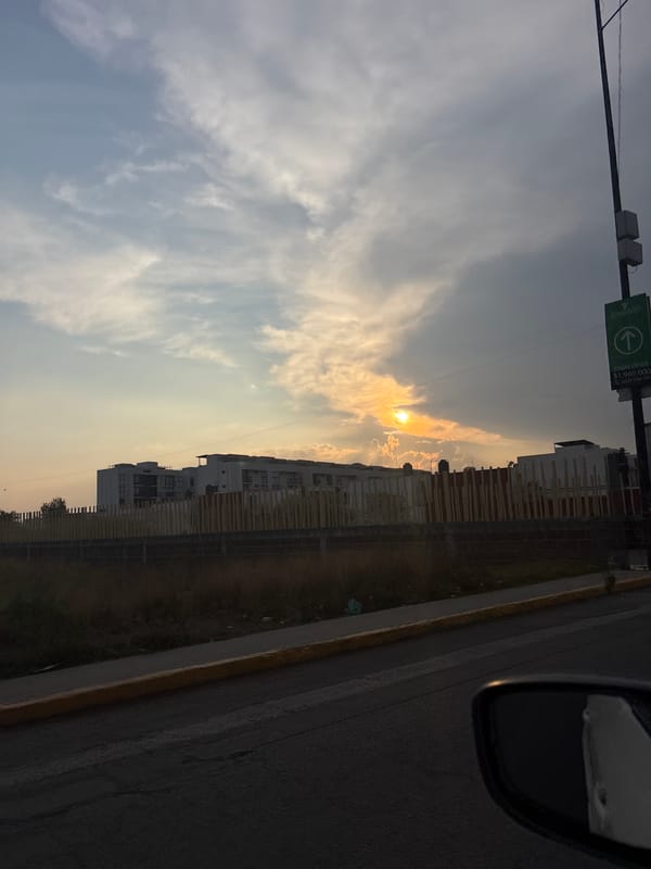 Nighttime roadside moment captured from vehicle in Puebla, Mexico