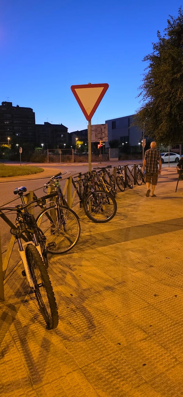 Huesca neighborhood at dusk, everyday street details