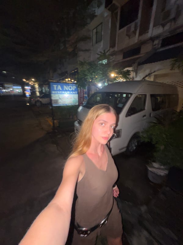 Woman takes bathroom selfie in Patong, Thailand