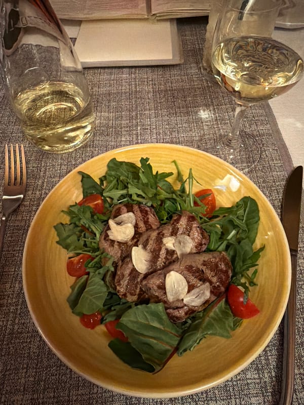Friends toast Italian meal in Riga restaurant Saturday afternoon