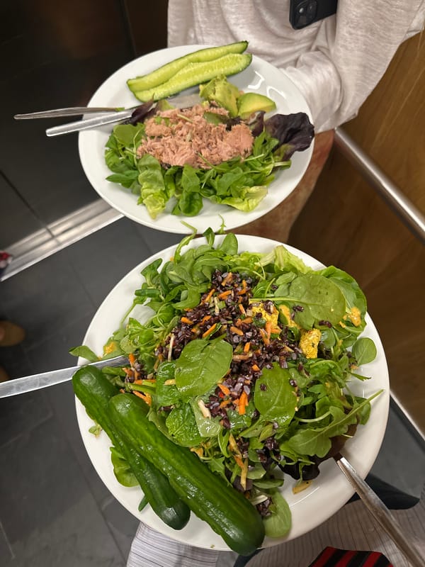Lunch scene captured in London with salads and juice