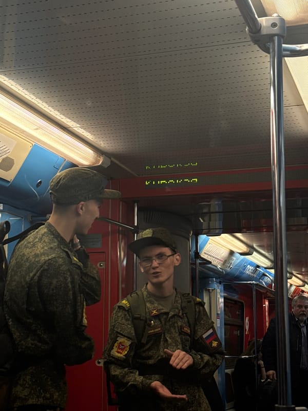 Russian soldiers ride Moscow Metro train through northwestern districts