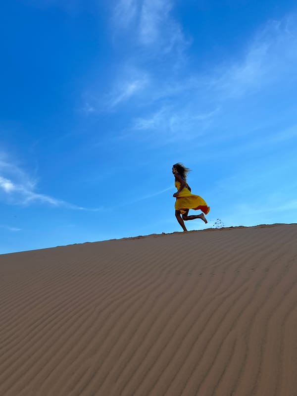 Posing and jumping through Mui Ne's sand dunes