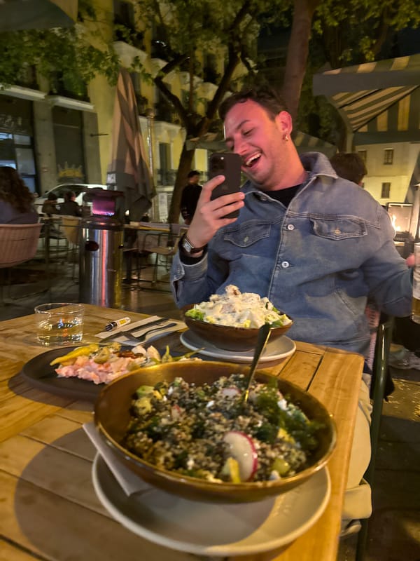 Diner documents meal with smartphone at Madrid restaurant