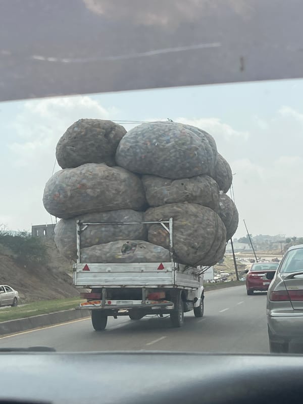 Loaded truck carrying sacks observed on Kugbo road
