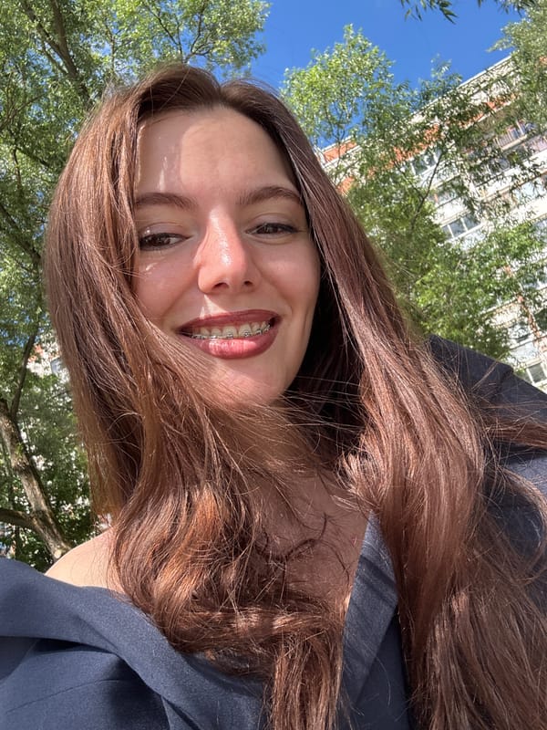 Sunny afternoon outdoors — selfie, boardwalk, and treetop sun