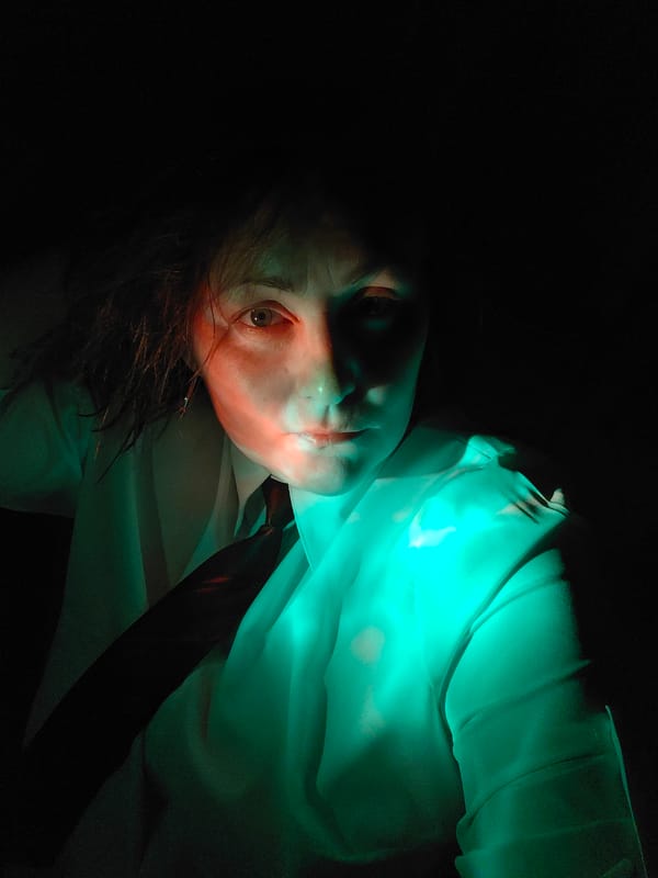 Dramatic portraits captured under colored lighting in Markovskii, Russia