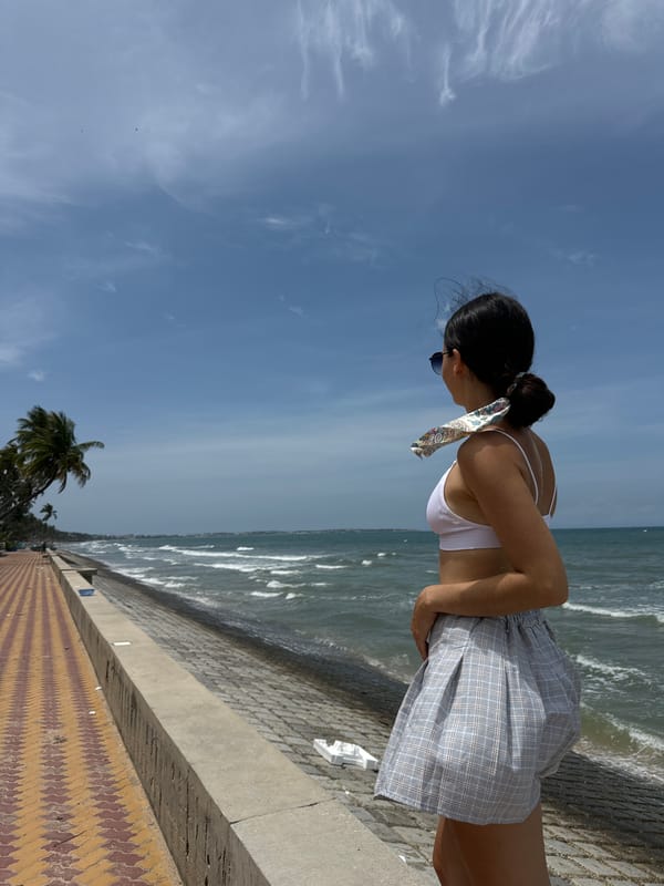 Woman enjoys early morning beach time in Mũi Né Vietnam