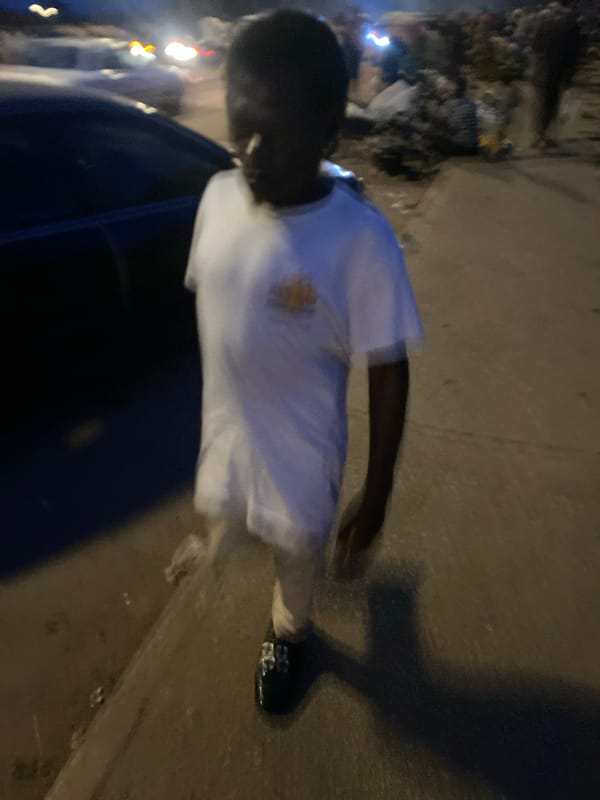 Evening street commerce unfolds across Bukuru, Nigeria markets