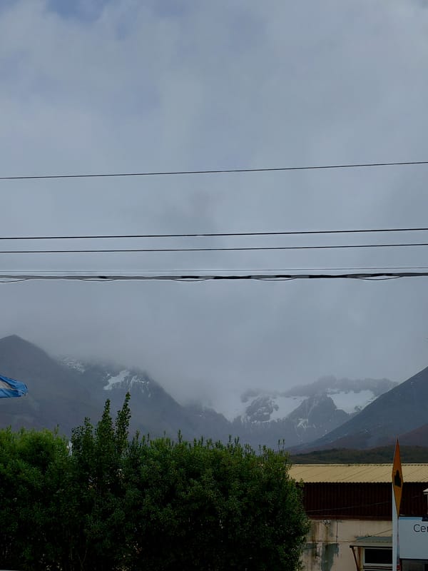 Cloudy conditions observed in Ushuaia with misty mountains