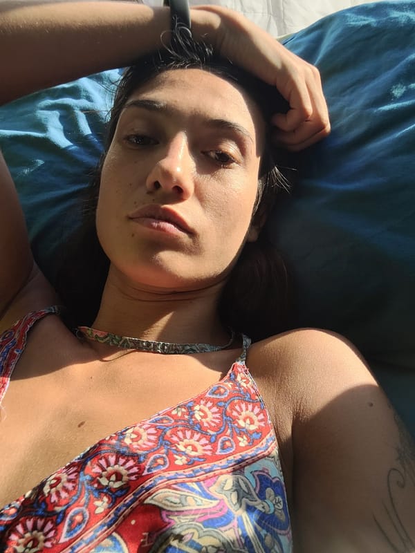 Woman rests indoors under bright LED lighting