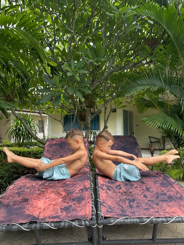 Kids taking a break on an outdoor trampoline in Ko Samui