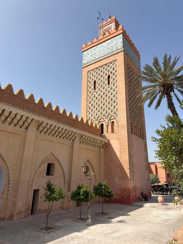 Tourist documents historic Mechouar Kasbah architecture in Morocco