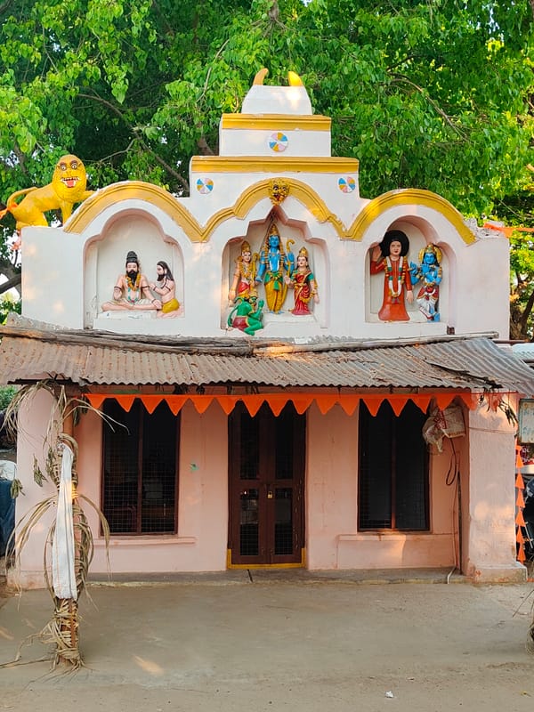 Village life captured in Mamillakunta: shrines, child, hen on scooter