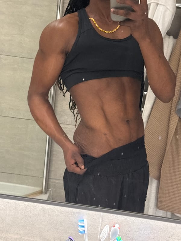 Person takes mirror selfie in London bathroom