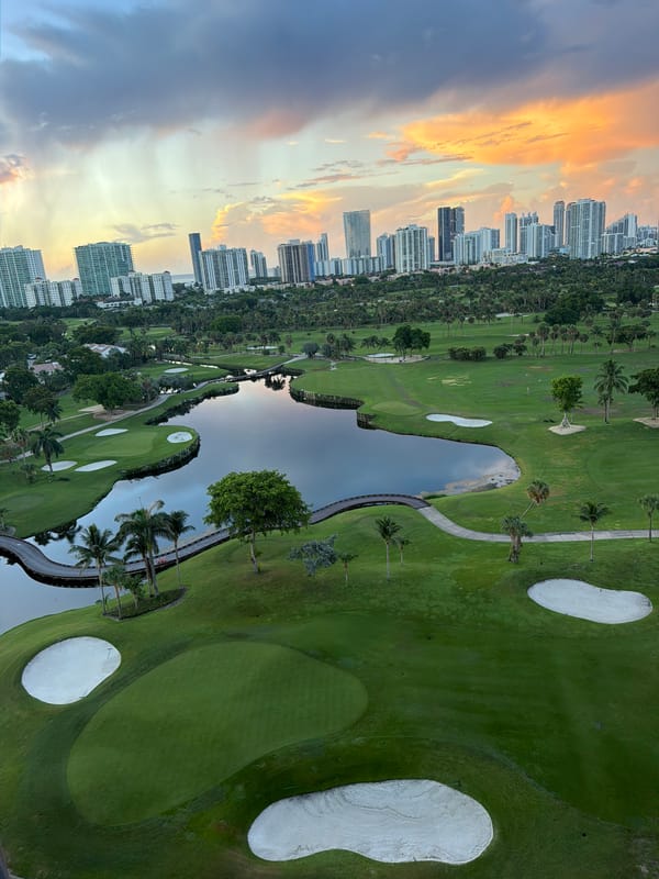 Aerial dusk view over an Aventura golf course