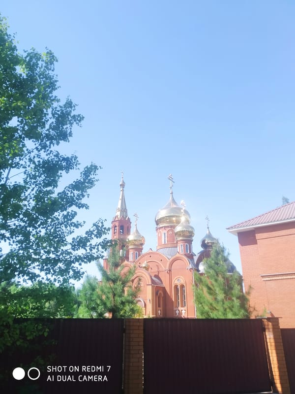 Spring scenes captured around Chaikovsky: church, forest growth, woodland road