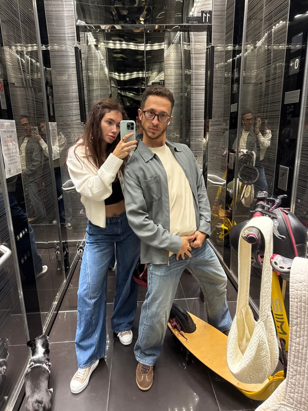 Couple Takes Selfie in Elevator with Electric Scooter